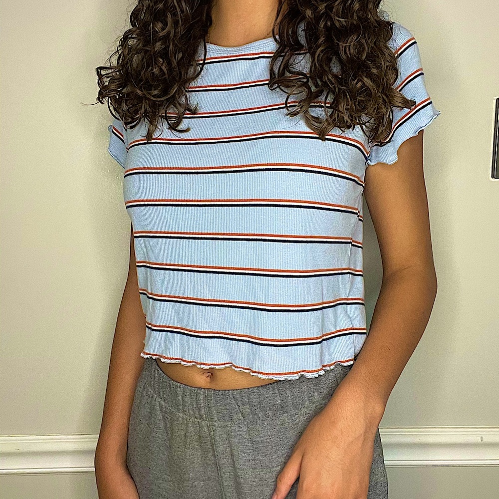 •blue, white, and red striped cropped top